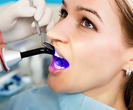 Woman receiving cosmetic dental bonding