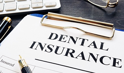 Dental insurance form on a table