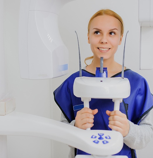 Woman receiving 3 D C T cone beam scans