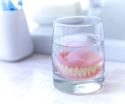 Partial dentures replacing five teeth on lower arch
