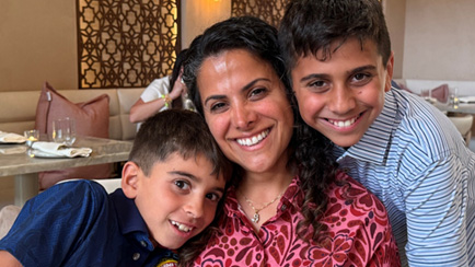 Dr. Melody Ward posing with her two sons