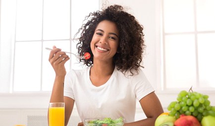 woman eating a salad