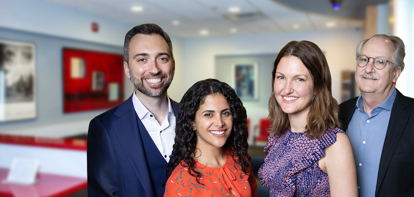 Baltimore dentists smiling in dental office