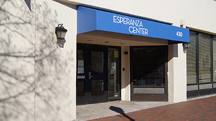 Two people entering the Esperanza Center