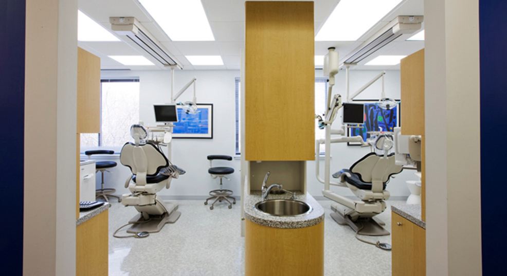 Hallway looking into two dental treatment rooms