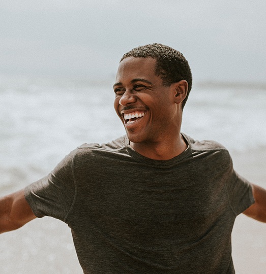 Smiling man enjoying time outdoors