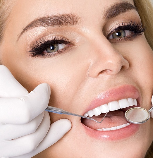 Woman at periodontist in Baltimore