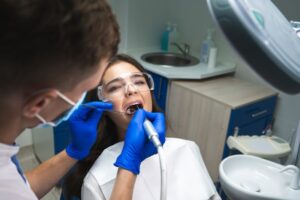 Young patient receiving root canal treatment. 